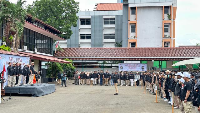 Bawaslu Jakarta menggelar apel siaga dalam rangka patroli pengawasan politik uang pada masa tenang Pilkada Jakarta 2024, Minggu (24/11/2024).