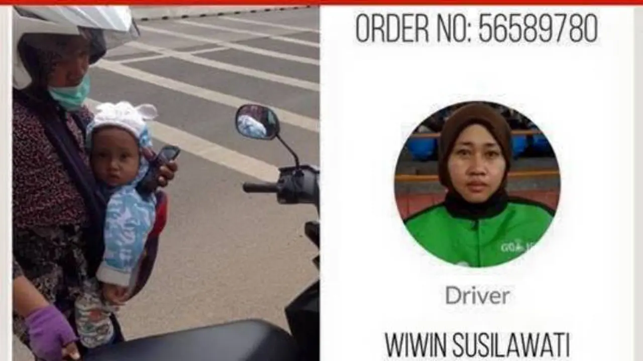 Sambil Gendong Bayi Gojek Driver ini Antarkan Penumpang
