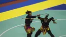 Pesilat Indonesia, Ketut Wilantari dan Ni Made Yanti, beraksi pada Invitation Tournament cabang pencak silat di Padepokan Pencak Silat, Jakarta, Rabu (14/2/2018). Event ini merupakan persiapan Asian Games 2018. (Bola.com/Vitalis Yogi Trisna)