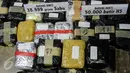 Barang bukti hasil pengungkapan sindikat peredaran narkotika jaringan internasional Malaysia di Gedung BNN, Jakarta, Jumat (28/10). Dari hasil operasi ini BNN menyita 39 kg sabu, 98.690 butir ekstasi, dan 50.000 butir H5. (Liputan6.com/Yoppy Renato)