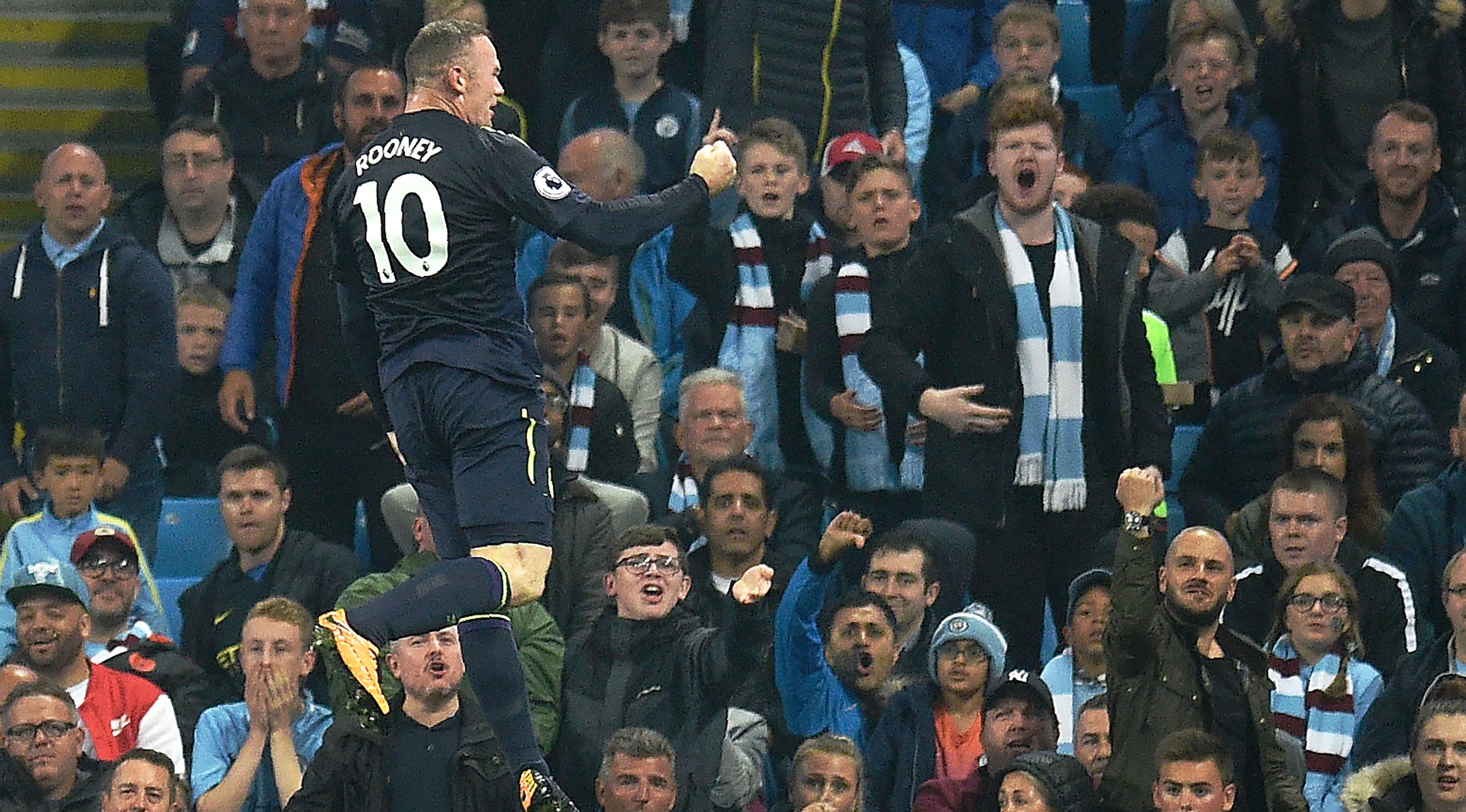 Wayne Rooney ingin fokus membela Everton. (AP/Dave Thompson)