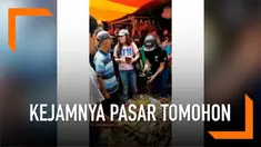 Aktivis hewan dunia datang ke Pasar Tomohon. Mereka tak tinggal diam dan menyelamatkan delapan ekor kucing yang akan dijual.