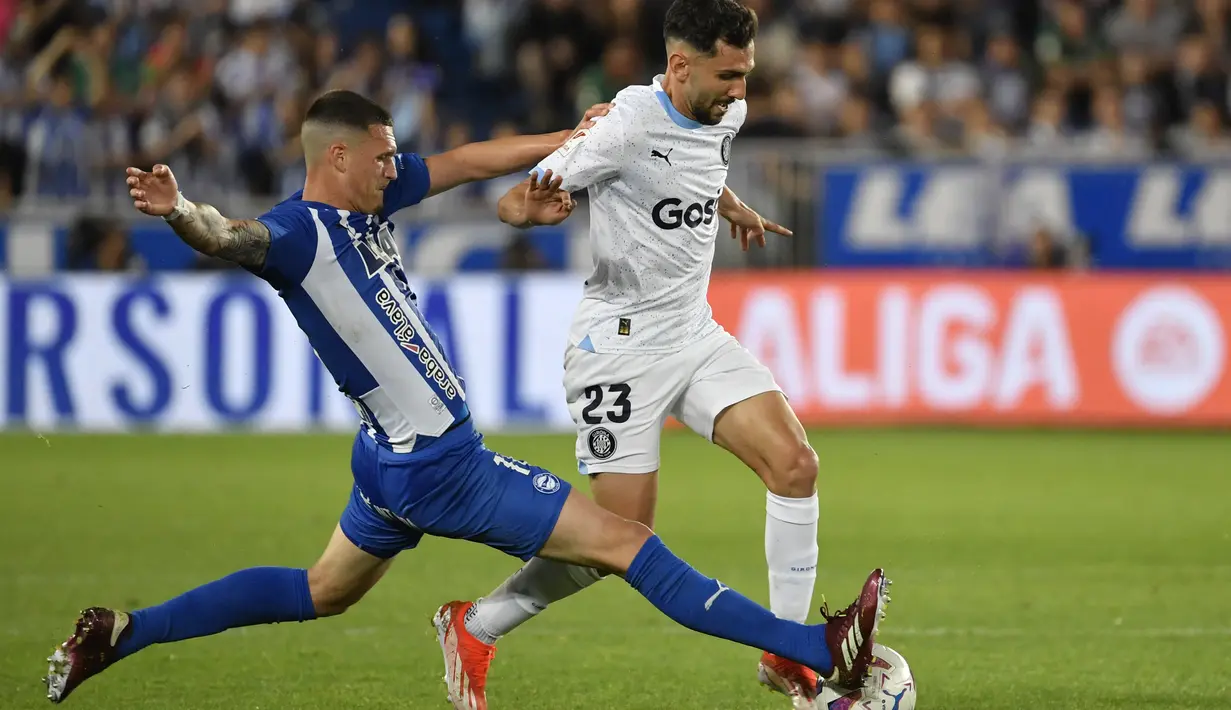 Girona FC ditahan imbang Deportivo Alaves dengan skor 2-2. (Ander Gillenea / AFP)