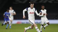 Gareth Bale turut menyumbangkan satu gol ketika Totttenham Hotspur membungkam Wolfsberger pada leg 2 babak 32 besar Liga Europa 2020/2021, Kamis (25/02/2021) dini hari WIB. (Adrian DENNIS / AFP)