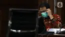 Mantan Wakil Ketua DPR Azis Syamsuddin saat mengikuti sidang lanjutan dugaan suap penanganan perkara korupsi di Lampung Tengah, Pengadilan Tipikor Jakarta, Senin (13/12/2021). Sidang bergaendakan pemeriksaan keterangan saksi-saksi. (Liputan6.com/Helmi Fithriansyah)