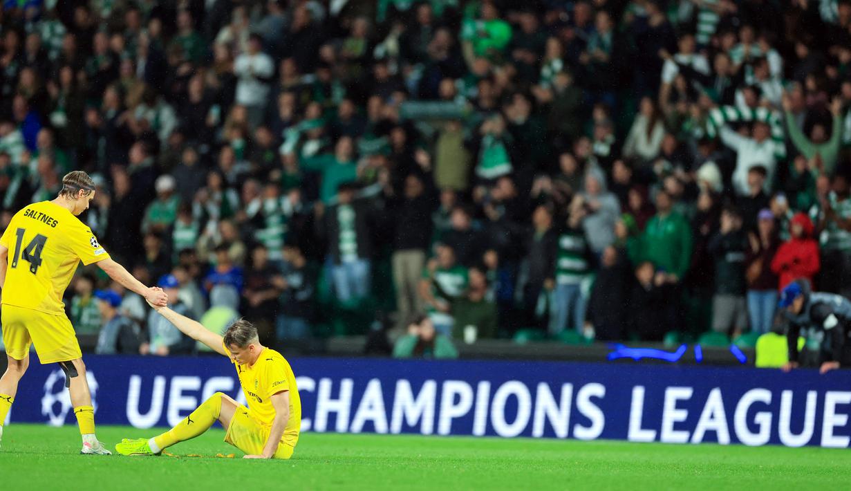Pencapaian itu makin terasa spesial karena mereka sempat menyingkirkan finalis musim lalu, Inter Milan, di babak play-off. Performa impresif itu berlanjut saat mereka menghajar Sporting dengan skor 3-0 di leg pertama. (AFP/Felipe Amorim)