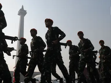 Prajurit TNI mengikuti Apel Gelar Pasukan Pengamanan KTT ASEAN di Silang Monas, Jakarta, Jumat (1/9/2023). (merdeka.com/Imam Buhori)