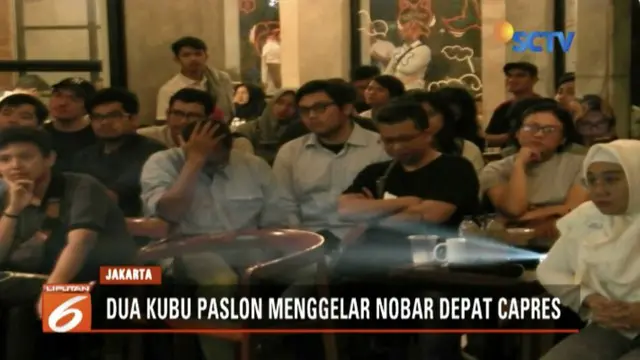 Dua kubu pendukung paslon gelar nobar debat perdana di sebuah kedai kopi di Kemayoran Baru, Jakarta.