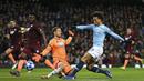 Gelandang Manchester City, Leroy Sane, mencetak gol ke gawang Hoffenheim pada laga Liga Champions di Stadion Etihad, Rabu (12/12). Manchester City menang 2-1 atas Hoffenheim. (AP/Dave Thompson)