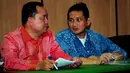 Udar Pristono (kanan) bersiap menjalani sidang praperadilan di PN Jakarta Pusat, Jakarta, Rabu, (18/3/2015). sidang praperadilan ditunda oleh hakim hingga 1 April 2015 karena termohon tak hadir. (Liputan6.com/Yoppy Renato)