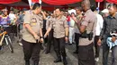 Kapolri Jenderal Tito Karnavian menghadiri kegiatan Sepeda Nusantara 2018 di kawasan Monas, Jakarta, Kamis (9/8). Kegiatan yang dihelat dalam rangka menyambut Asian Games 2018 ini juga untuk mendukung Jakarta Langit Biru. (Liputan6.com/Immanuel Antonius)