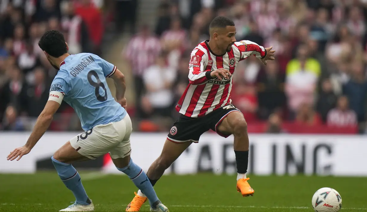 Meski melawan tim divisi dua, Man City yang menurunkan tim terbaiknya termasuk Erling Haaland sempat dibuat kesulitan di babak pertama walau bisa unggul 1-0. (AP Photo/ Alastair Grant)