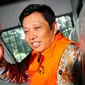 Machfud Suroso berada dalam mobil tahanan usai pembacaan vonis oleh majelis hakim di Pengadilan Tipikor, Jakarta, Rabu (1/4/2015). Machfud dianggap melakukan tindak pidana korupsi dalam proyek P3SON Hambalang. (Liputan6.com/Yoppy Renato)