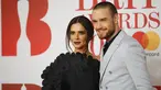 Pasangan penyanyi, Liam Payne dan Cheryl Cole menghadiri karpet merah acara BRIT Awards 2018 di London, Rabu (21/2). Sempat dikabarkan putus, Liam Payne dan Cheryl membuktikan hubungan mereka baik-baik saja dengan hadir bersama. (Tolga AKMEN / AFP)
