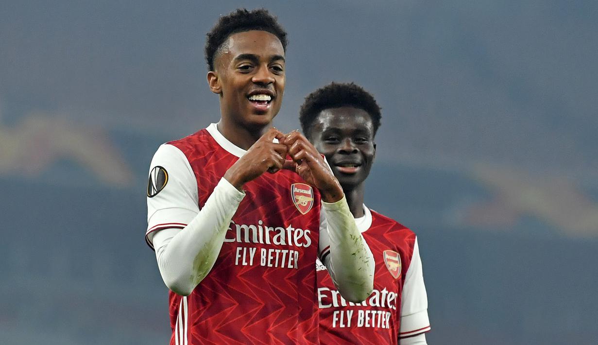 Gelandang Arsenal, Joe Willock, merayakan gol yang dicetaknya ke gawang Molde pada laga lanjutan Grup B Liga Europa 2020/2021 di Emirates Stadium, Jumat (6/11/2020) dini hari WIB. Arsenal menang 4-1 atas Molde. (AFP/Glyn Kirk)