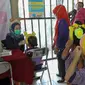 Kegiatan imunisasi ini diikuti oleh 100 peserta dari murid Pendidikan Anak Usia Dini (PAUD) di sekitar Kecamatan Gambir. (Liputan6.com/Herman Zakharia)