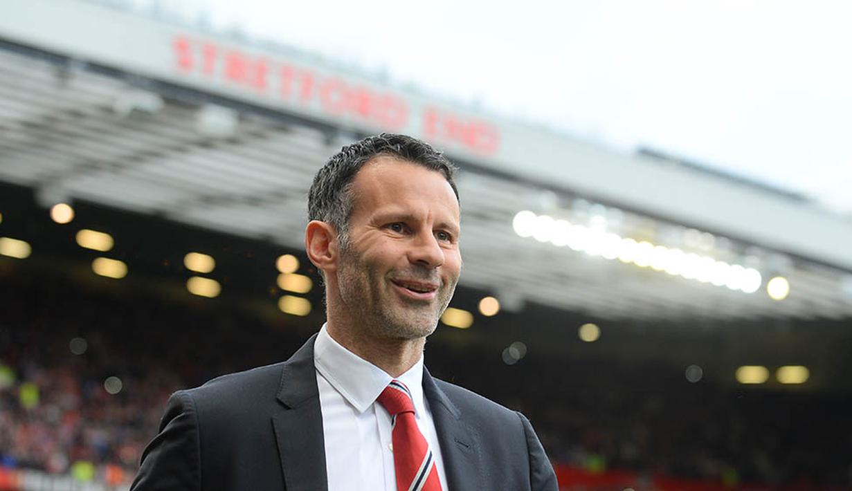 Pasca gantung sepatu, Ryan Giggs sempat menjabat caretaker Manchester United selama empat pertandingan, menggantikan David Moyes yang dipecat pada 22 April 2014. (AFP/Andrew Yates)