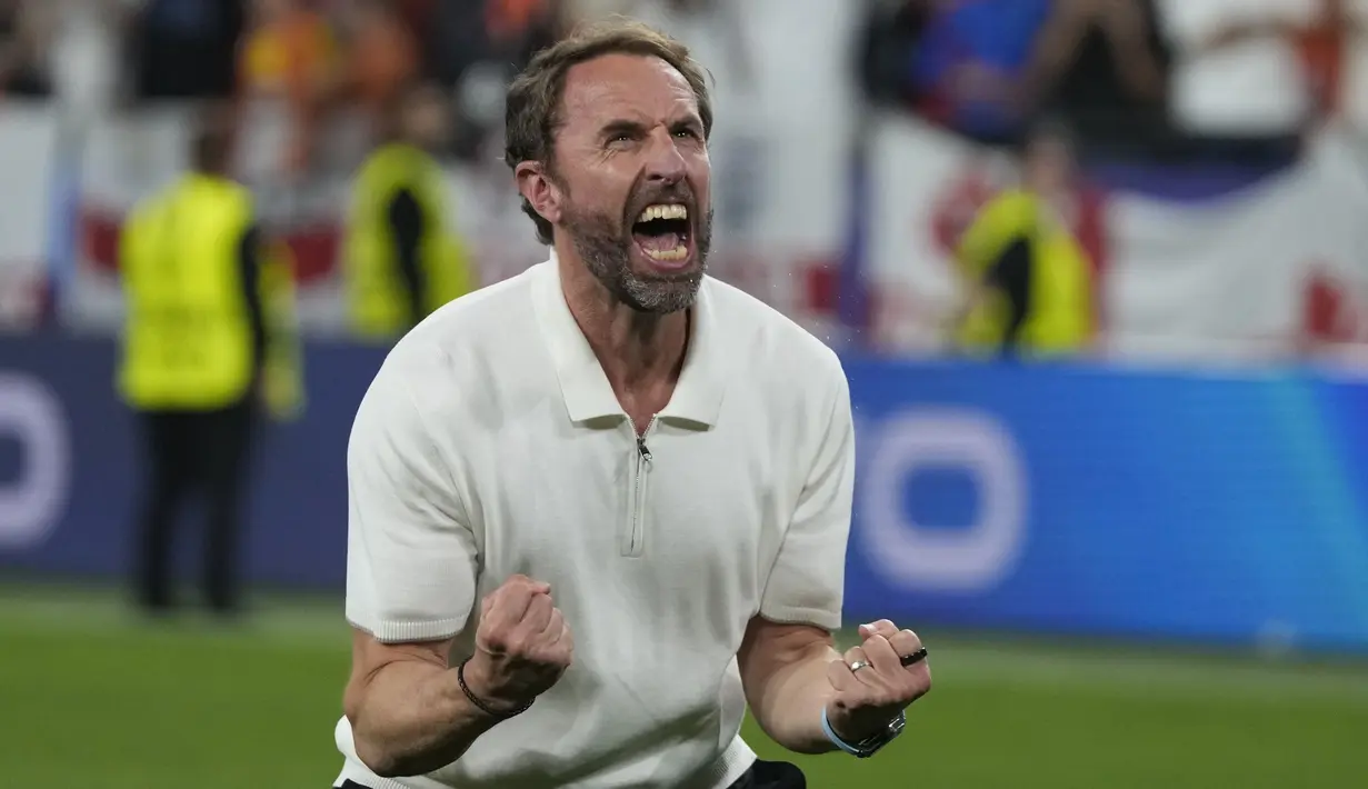 Gareth Southgate menjadi sosok yang paling bahagia setelah berhasil membawa timnya ke Final Euro 2024. (AP Photo/Thanassis Stavrakis)