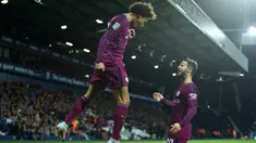 Selebrasi gol pemain Manchester City, Leroy Sane (kiri) bersama rekannya Bernardo Silva saat melawan West Bromwich Albion pada laga Piala Liga Inggris di The Hawthorns, West Bromwich, (20/9/2017). City menang 2-1. (AFP/Oli Scarff)