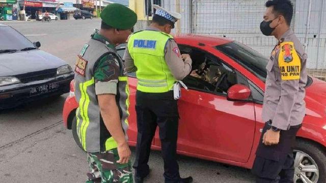 Tim  Gabungan dari Kepolidian Kota Banyuwangi, dan TNI lakukan penyekatan di Pelabuhan ASDP Ketapang Banyuwangi (Istimewa)