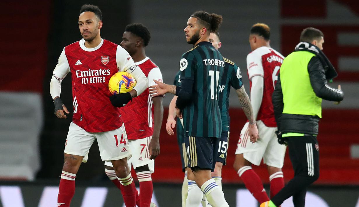 Pierre-Emerick Aubameyang tercatat pernah membela Arsenal selama 5 musim mulai tengah musim 2017/2018 hingga tengah musim 2021/2022. Total tampil dalam 128 laga di Premier League bersama The Gunners, ia mampu mencetak 68 gol dan 16 assist, termasuk satu kali hattrick. Hattrick tersebut dibuat ke gawang Leeds United pada pekan ke-24 musim 2020/2021 (14/2/2021) dalam laga yang berakhir 4-2. (AFP/Pool/Catherine Ivill)