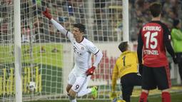 Pemain Bayern Munich, Robert Lewandowski berada pada urutan kedua topskor dengan 14 gol dari 28 kali Shots on target pada laga Bundesliga hingga pekan ke-18. (Patrick Seeger/dpa via AP)