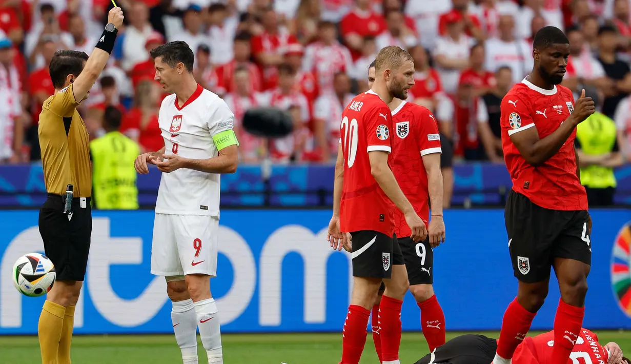 Polandia sempat menyamakan skor berkat gol Krzystof Piatek di menit ke-30. (AXEL HEIMKEN/AFP)