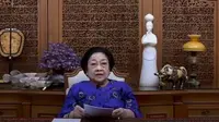 Megawati sedang menyampaikan pidatonya lewat sebuah video saat membuka KKN Kebangsaan 2022 di Universitas Palangka Raya, Kalimantan Tengah (Dok. Liputan6.com/Muhammad Radityo Priyasmono)