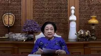 Megawati sedang menyampaikan pidatonya lewat sebuah video saat membuka KKN Kebangsaan 2022 di Universitas Palangka Raya, Kalimantan Tengah (Dok. Liputan6.com/Muhammad Radityo Priyasmono)