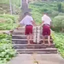 Viral Murid SD Nias Selatan Angkut Tumpukan Ompreng MBG Lewati Jalan Curam