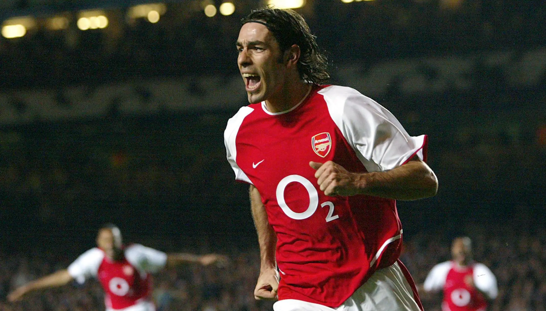 Robert Pires menjadi bagian penting Arsenal dan sangat dicintai fans Arsenal. Pires membawa Arsenal meraih 2 gelar Liga Premier Inggris dan 3 gelar Piala FA. (AFP/Odd Andersen)