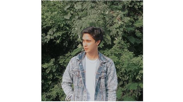 Dulu ia terlihat imut, kini Kevin Gutomo sudah tumbuh menjadi pria dewasa.