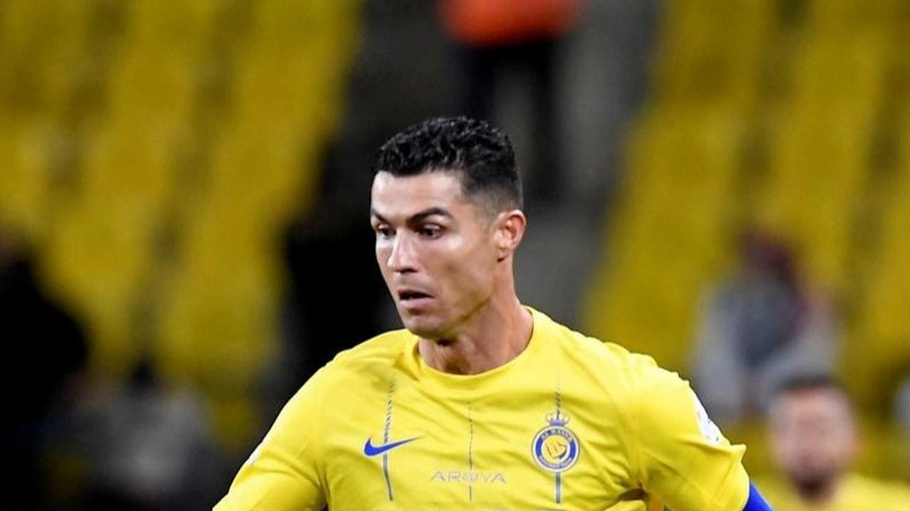 Tiga gol Ronaldo ke gawang Al Tai pun memantapkan posisinya di puncak daftar top skorer Liga Arab Saudi musim 2023/2024. Foto: REUTERS / Stringer<br>