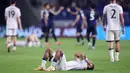 Ekspresi pemain belakang Timnas Indonesia, Yance Sayuri (tengah) usai pertandingan putaran ketiga Kualifikasi Piala Dunia 2026 zona Asia grup C melawan Jepang di Stadion Panasonic Suita, Osaka, Selasa (10/6/2025). (PAUL MILLER/AFP)