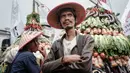 Dalam aksinya, para pengunjuk rasa menyatakan sikap bahwa 'Reforma Agraria Dimanipulasi, Langgar Konstitusi'. (Yasuyoshi CHIBA/AFP)