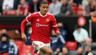 Mason Greenwood. Striker Manchester United ini hanya sekali absen dalam 11 laga Setan Merah di Liga Inggris musim ini dan semuanya manjadi starter. Kelemahannya adalah masih belum dapat meredam sikap egoisnya. Marcus Rashford cocok menggantikannya sebagai starter. (AFP/Adrian Dennis)