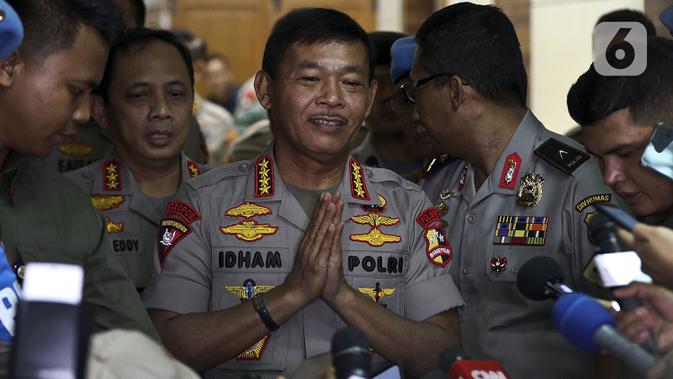 Kapolri Jenderal Polisi Idham Azis usai rapat kerja perdana dengan Komisi III DPR di Kompleks Parlemen, Jakarta, Kamis (30/1/2020). Rapat membahas Rencana Kerja 2020, Tindak lanjut kasus Novel Baswedan, Penanganan Kasus Natuna, Penanganan Kasus Taman Sari dan isu lainnya.(Liputan6.com/Johan Tallo)
