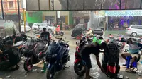 Jelang Lebaran, Mekanik Bengkel di Gorontalo banyak menerima orderan servis kendaraan (Arfandi Ibrahim/Liputan6.com)