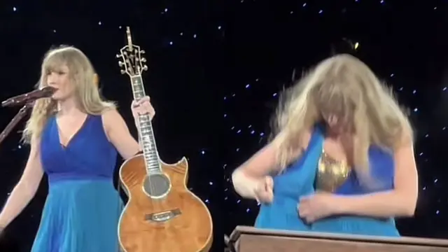 Taylor Swift terlihat sedang mengatasi masalah malfunction wardrobe di atas panggung.