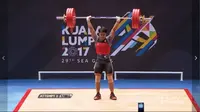 Lifter Indonesia, Ketut Ariana, menyumbangkan medali emas dari kelas 77 kg pada SEA Games 2017, Selasa (29/8/2017). (Vidio.com)