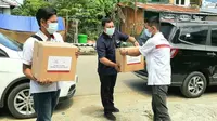 Wuling Motors dan Kumala Group menyalurkan bantuan untuk masyarakat yang terdampak bencana alam di Majene-Mamuju, Sulawesi Barat. (Wuling)