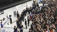 Tim Nasional Jepang mendapatkan sambutan meriah sesampainya di&nbsp;bandara Narita Airport.