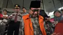 Mantan Sekjen Kementerian ESDM, Waryono Karno, usai menjalani pemeriksaan penyidik KPK, Jakarta, Selasa (6/1/2015). (Liputan6.com/Miftahul Hayat)