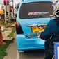 Salah satu badut jalanan Kota Gorontalo (Arfandi Ibrahim/Liputan6.com)