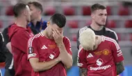 Ekspresi para pemain Manchester United di akhir laga final Liga Europa melawan Tottenham di San Mames, Bilbao, Spanyol, Rabu, 21 Mei 2025. (AP Photo/Bernat Armangue)