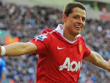 Striker MU Javier Hernandez usai mencetak gol ke gawang Wigan yang digilas 4-0 dalam lanjutan Liga Premier di DW Stadium, 26 Februari 2011. AFP PHOTO/ANDREW YATES