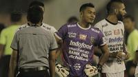 Kiper Bali United, Wawan Hendrawan, saat pertandingan melawan Madura United pada laga Piala Presiden di Stadion Manahan, Solo, Sabtu, (3/2/2018). Bali United menang adu penalti 5-4 atas Madura United. (Bola.com/M Iqbal Ichsan)