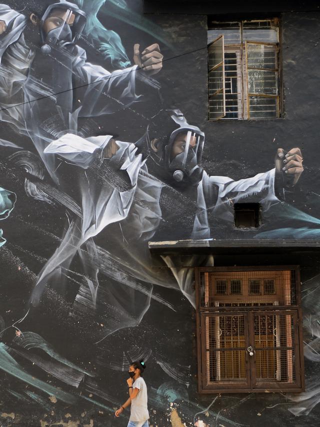 FOTO: Ekspresi Seniman Mural Dunia Menghadapi Corona