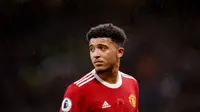 Jadon Sancho - Pemain berusia 21 tahun itu belum juga menunjukkan kemampuan terbaiknya hingga saat ini di Manchester United. Meski begitu mantan bintang Bundesliga ini tetap menerima gaji sebesar 350 ribu pound sterling atau senilai Rp6,8 miliar per pekan. (AFP/Oli Scarff)