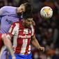 Gerard Pique saat Barcelona melawan Atletico Madrid (AFP)